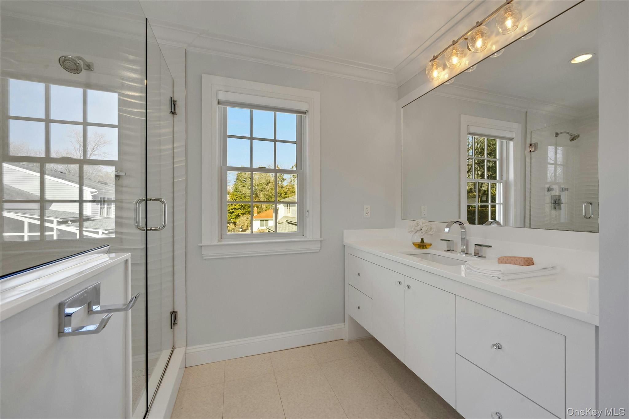44 Brevoort Lane Rye, NY 10580 - Photo 24 of 32 Sleek floating vanity with glass enclosed shower off bedroom #5