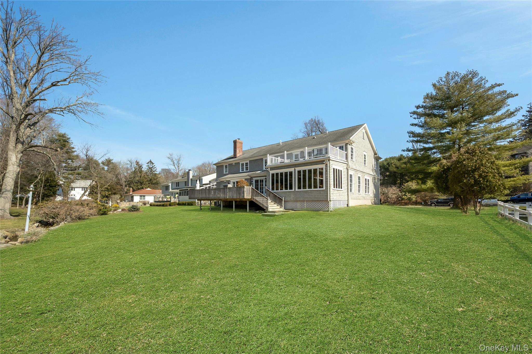 44 Brevoort Lane Rye, NY 10580 - Photo 25 of 32 An expansive, level backyard offers exceptional space for recreation, entertaining or simply enjoy the outdoors.