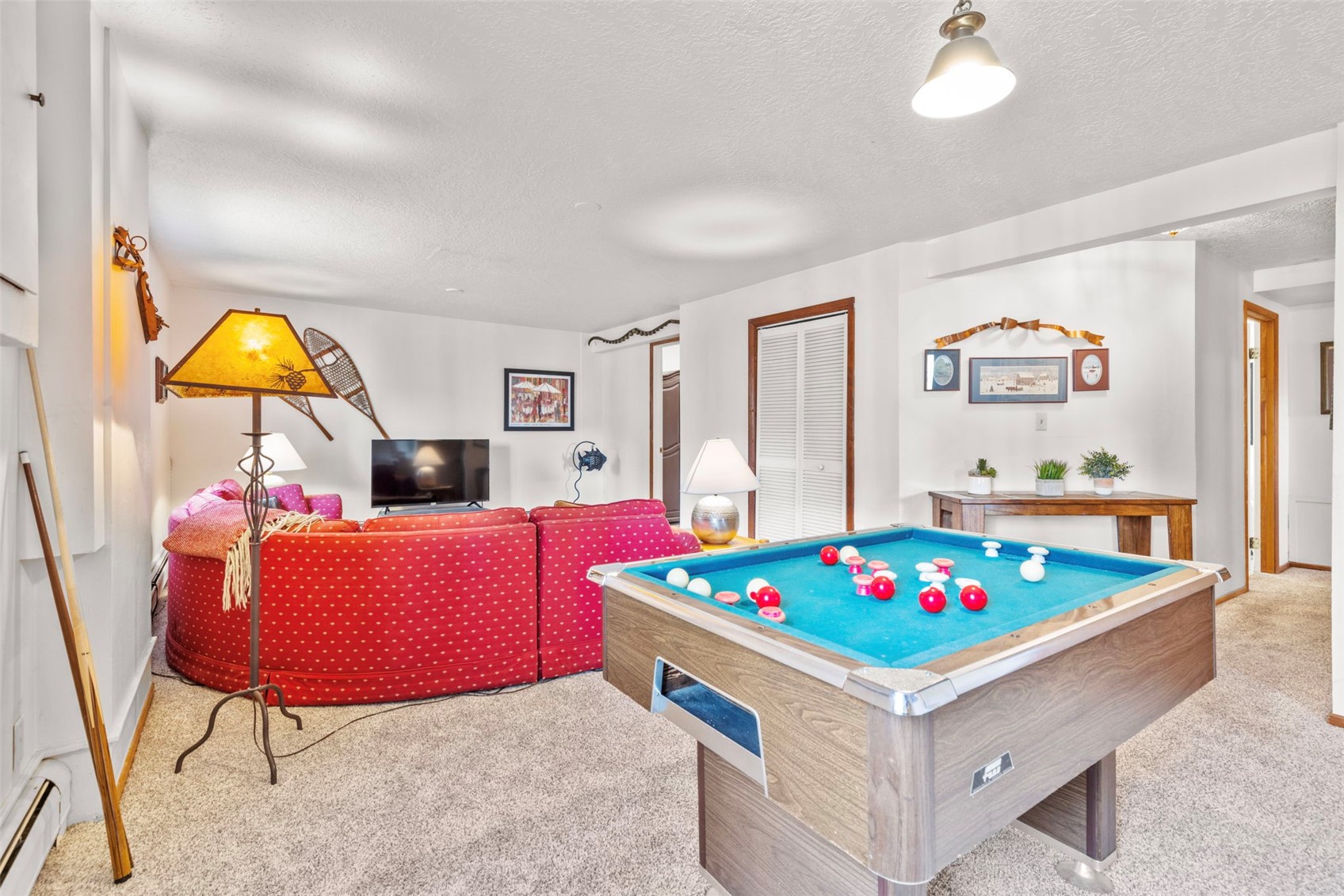 79 Forest Canyon Road Dillon, CO 80435 - Photo 41 of 50 Rec room with a textured ceiling, billiards, a baseboard radiator, and carpet flooring