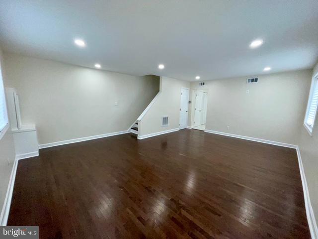 2301 Wyngate Road Suitland, MD 20746 - Photo 3 of 16 an empty room with wooden floor
