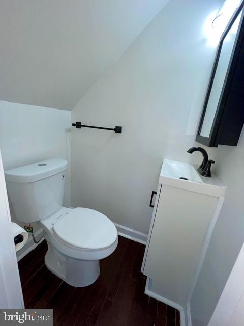 2301 Wyngate Road Suitland, MD 20746 - Photo 7 of 16 a white toilet sitting next to a small sink
