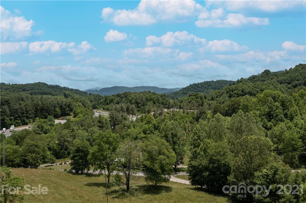 0 Sylvan Acres Road Waynesville, NC 28785 - Photo 4 of 7 a view of a city with lush green forest