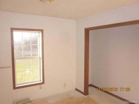 4425 Adams Road Stockbridge, MI 49285 - Photo 11 of 15 11 BEDROOM 2.JPG