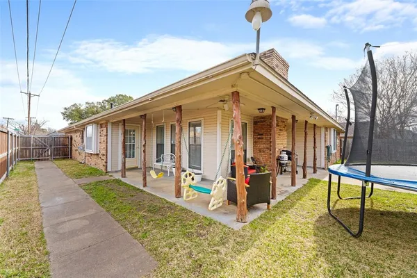 a view of yard with swimming pool