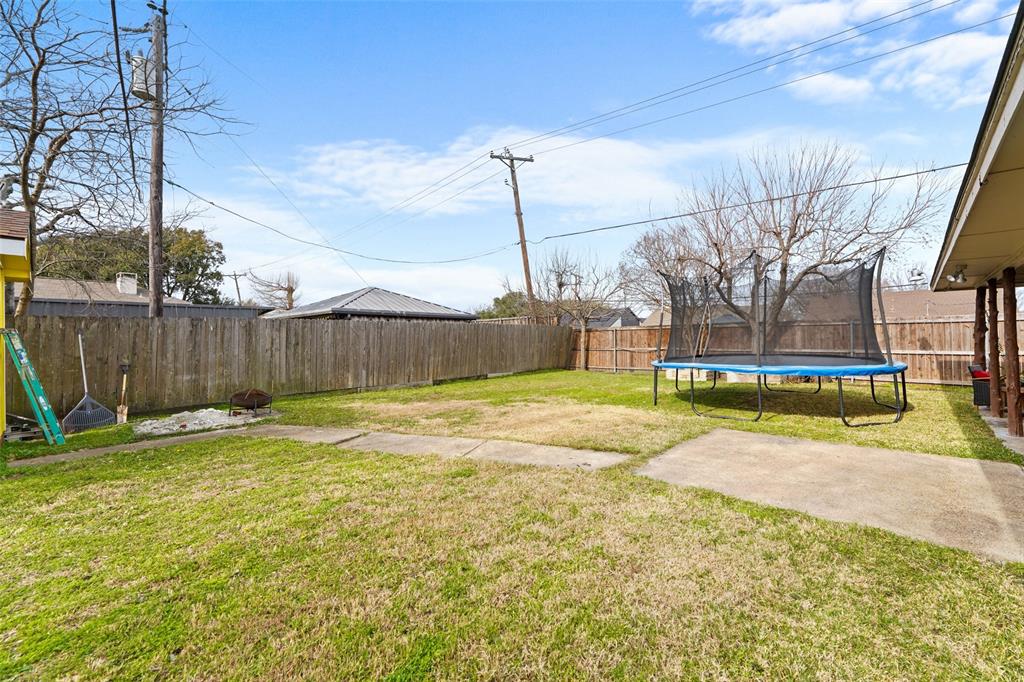 708 Azalea Drive Forney, TX 75126 - Photo 18 of 18 a view of yard with swimming pool