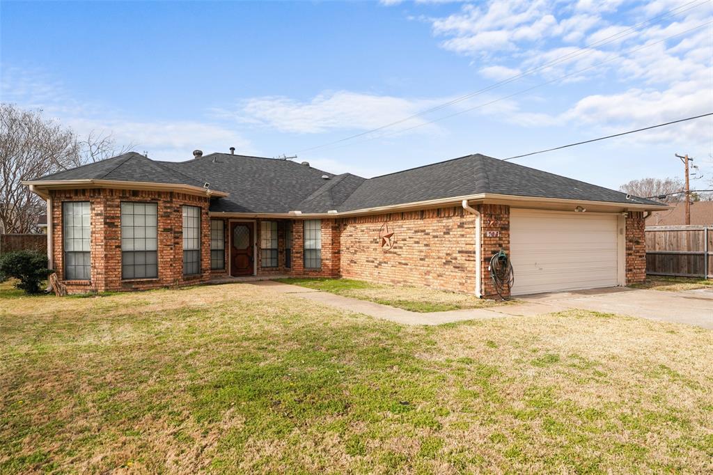 708 Azalea Drive Forney, TX 75126 - Photo 2 of 18 a front view of a house with a garden