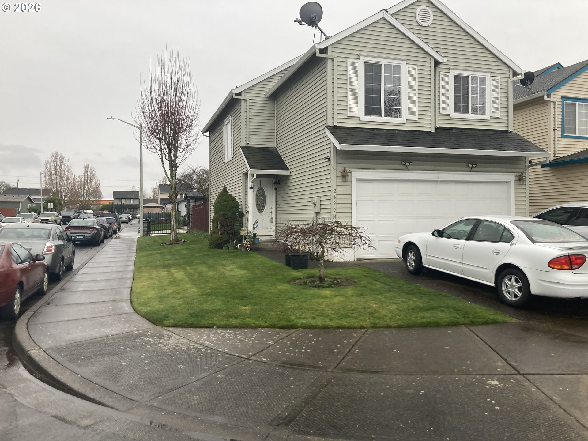 2499 North Holladay Street Cornelius, OR 97113 - Photo 1 of 26 a view of a car parked in front of a house