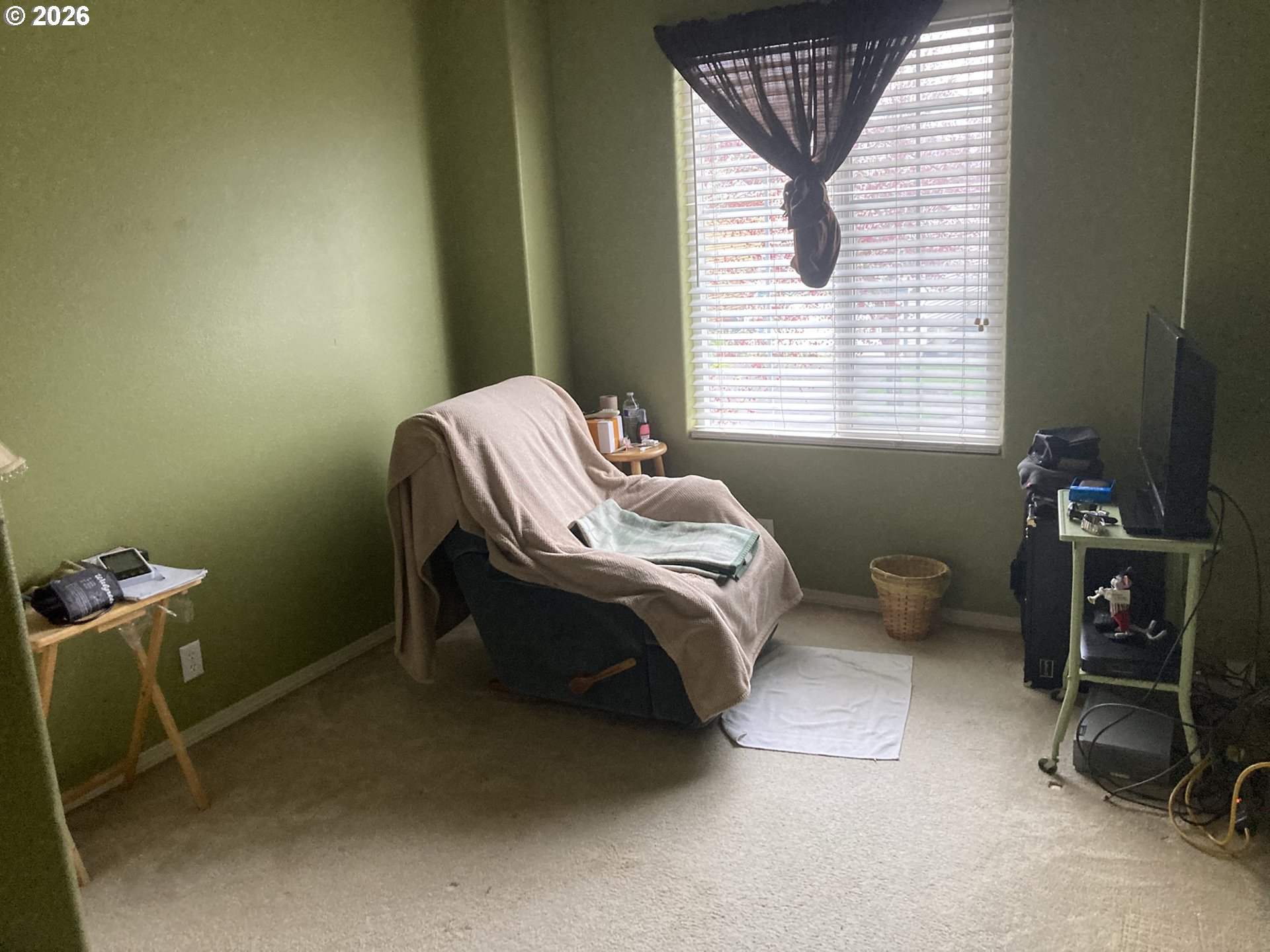 2499 North Holladay Street Cornelius, OR 97113 - Photo 16 of 26 a bedroom with a bed and a window