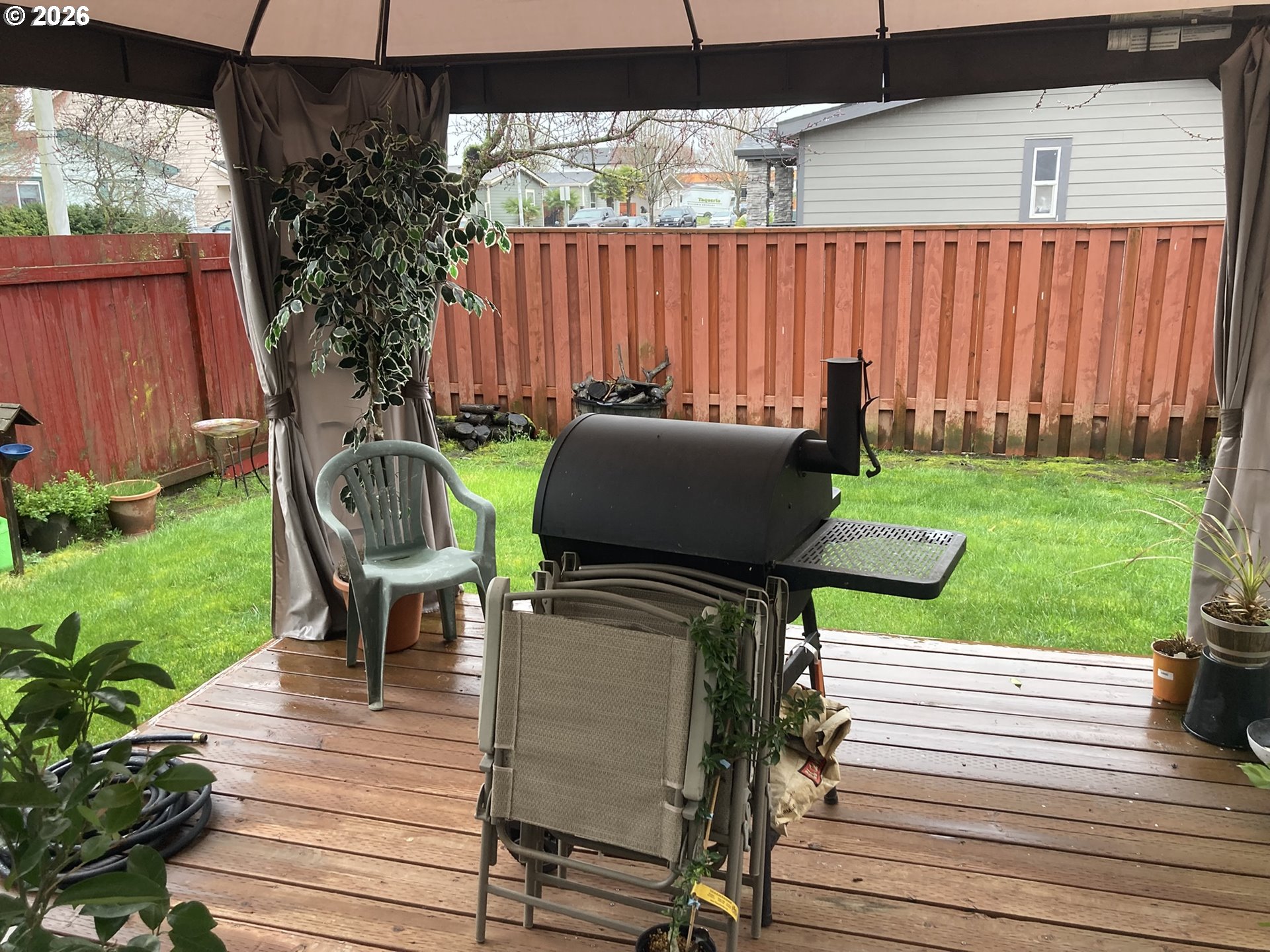 2499 North Holladay Street Cornelius, OR 97113 - Photo 24 of 26 a view of a chairs and table on the wooden deck