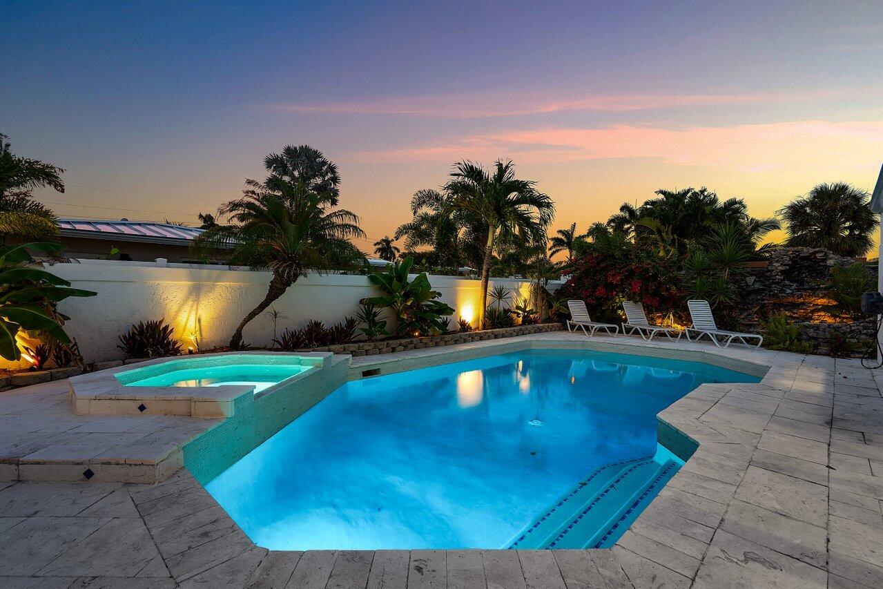2611 Northeast 49th Street Lighthouse Point, FL 33064 - Photo 50 of 56 Twilight Pool/Spa NE