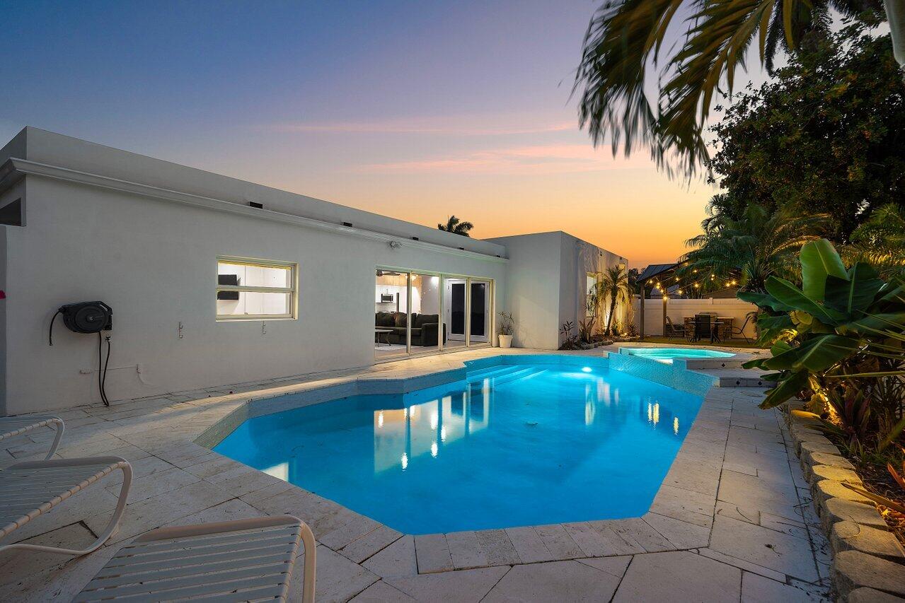 2611 Northeast 49th Street Lighthouse Point, FL 33064 - Photo 53 of 56 Twilight Whole View Backyard SW