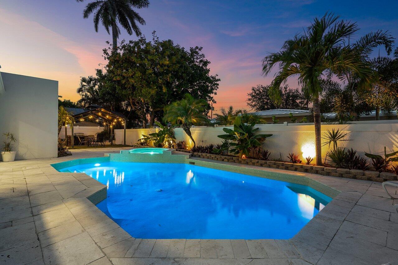 2611 Northeast 49th Street Lighthouse Point, FL 33064 - Photo 54 of 56 Twilight Whole View Backyard NW