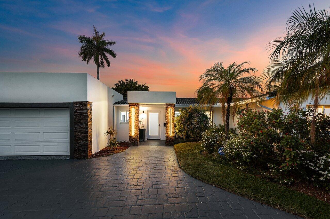 2611 Northeast 49th Street Lighthouse Point, FL 33064 - Photo 7 of 56 Twilight Front Entry