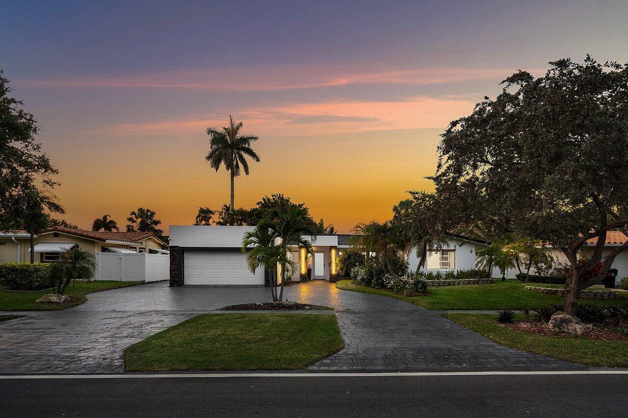 2611 Northeast 49th Street Lighthouse Point, FL 33064 - Photo 8 of 56 Twilight Front