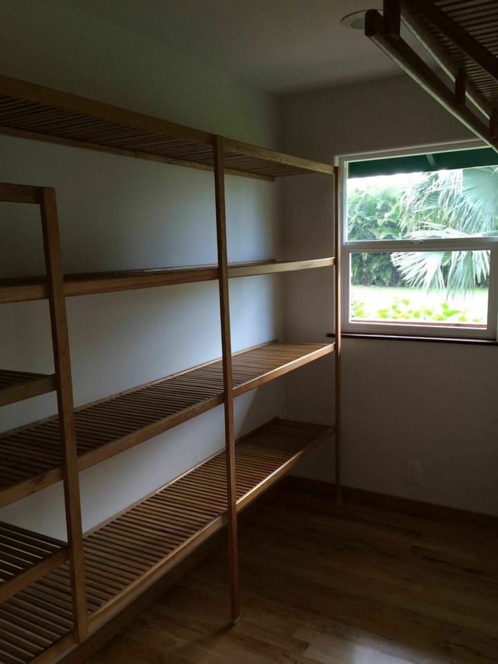 851 Peahi Road Haiku, HI 96708 - Photo 29 of 30 a view of empty room with wooden floor and fan
