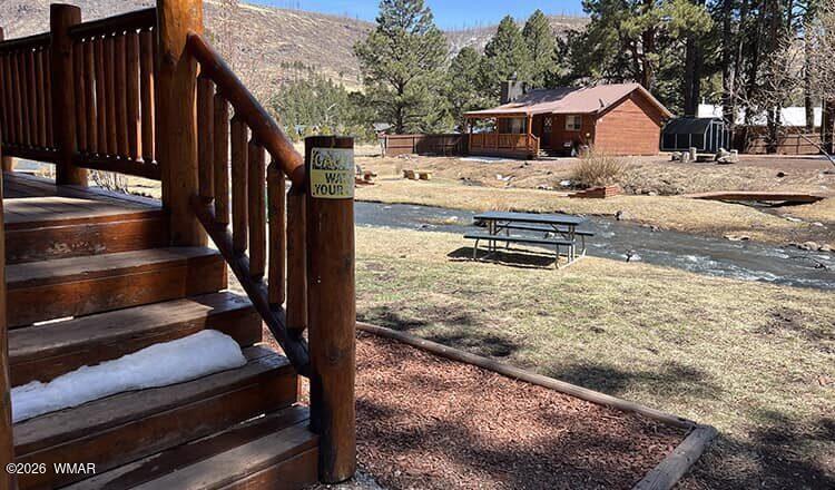 94 Main Street Greer, AZ 85927 - Photo 3 of 10 a view of outdoor space and wooden deck