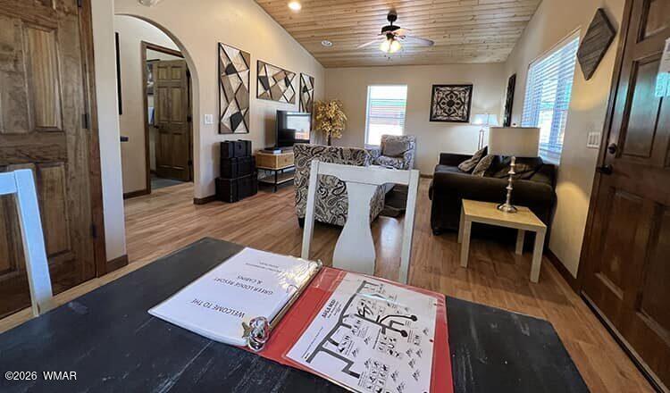94 Main Street Greer, AZ 85927 - Photo 6 of 10 a living room with furniture and a table