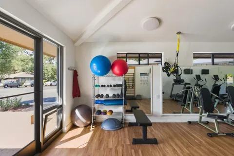 a view of a room with gym equipment