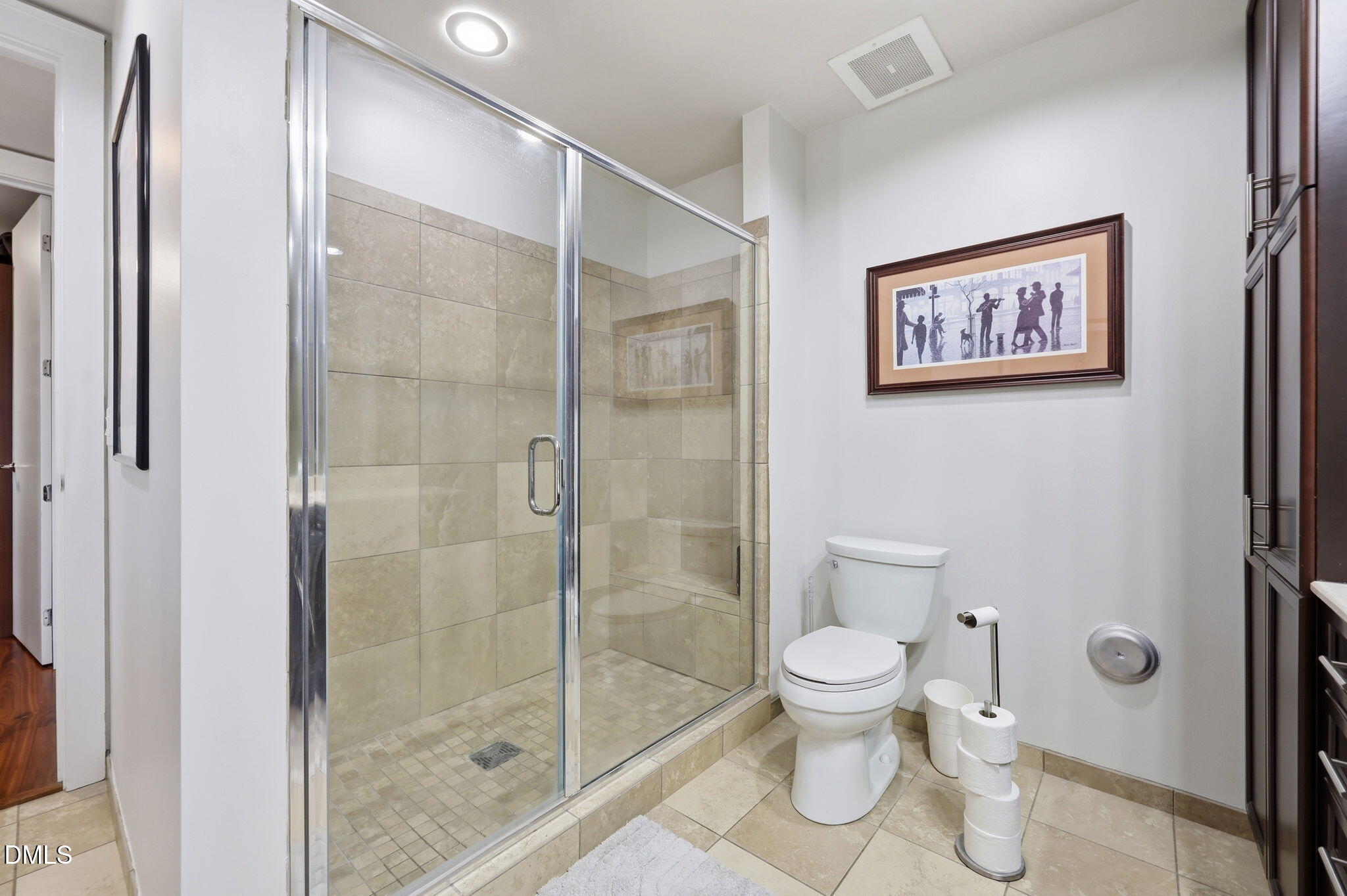 618 North Boylan Avenue, Unit 718 Raleigh, NC 27603 - Photo 14 of 38 a bathroom with a toilet and a shower