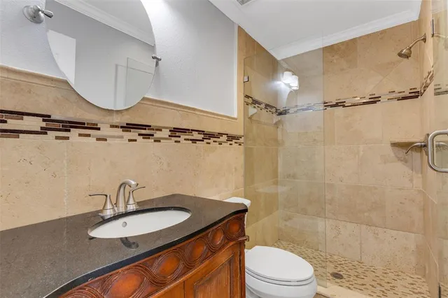 a view of a livingroom and a dining room with furniture window and outside view