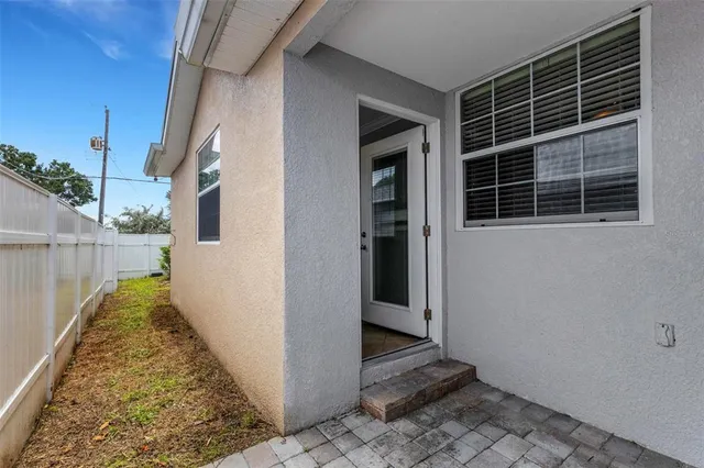 a view of front door with furniture