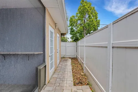 a bathroom with a toilet a sink and a mirror