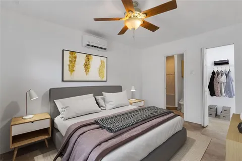 a view of storage and utility room with a window