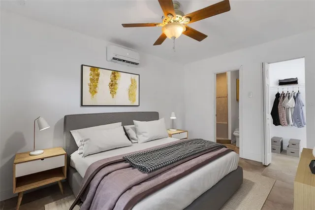 a view of storage and utility room with a window