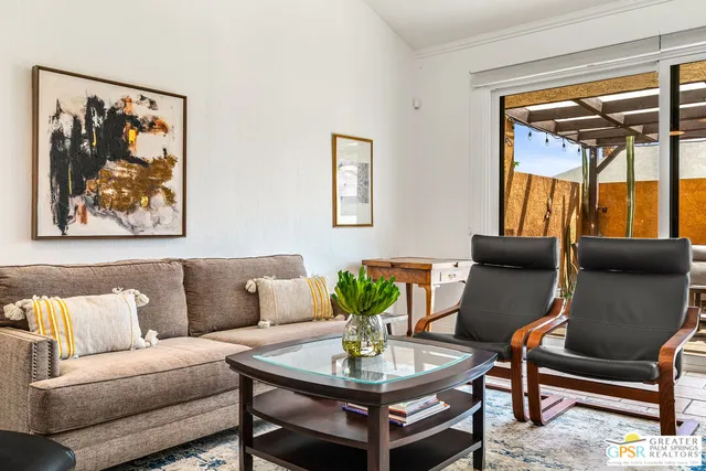 a living room with furniture and a couch