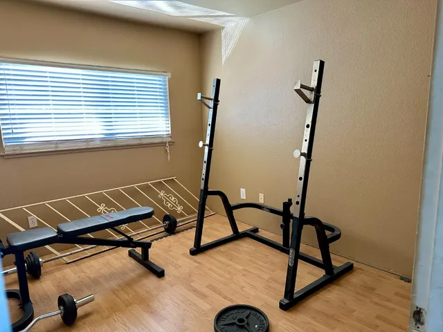 a view of a room with gym equipment