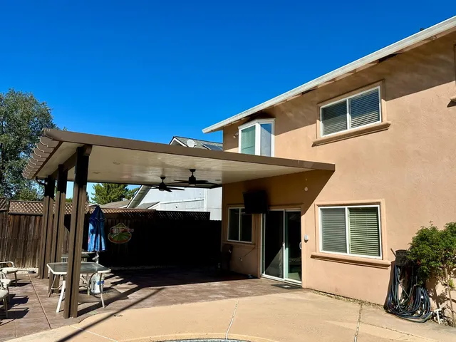 a front view of a house with parking