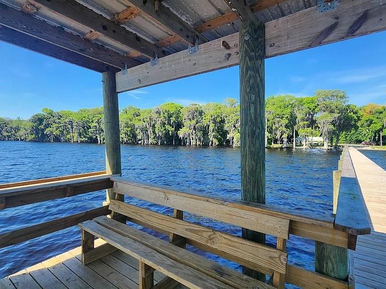 817 Paradise Boulevard Georgetown, FL 32139 - Photo 10 of 14 a view of deck with wooden floor and outdoor space