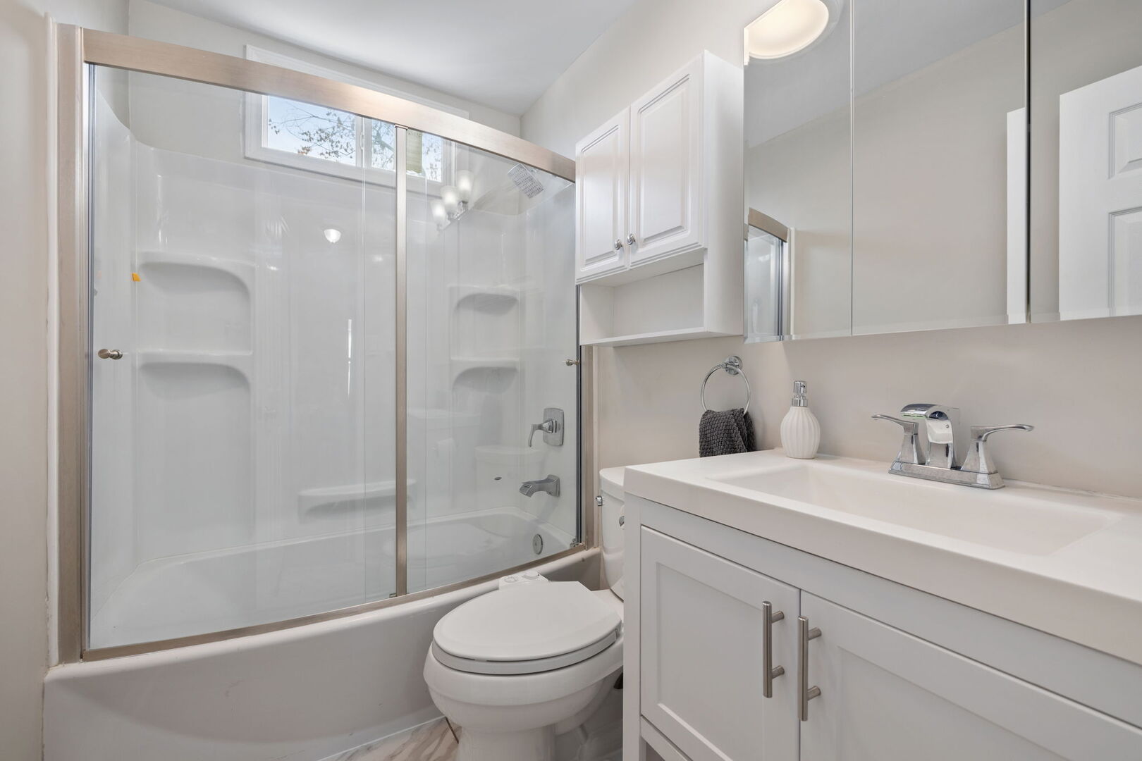 235 Murphy Drive Romeoville, IL 60446 - Photo 13 of 16 a bathroom with a sink toilet and shower