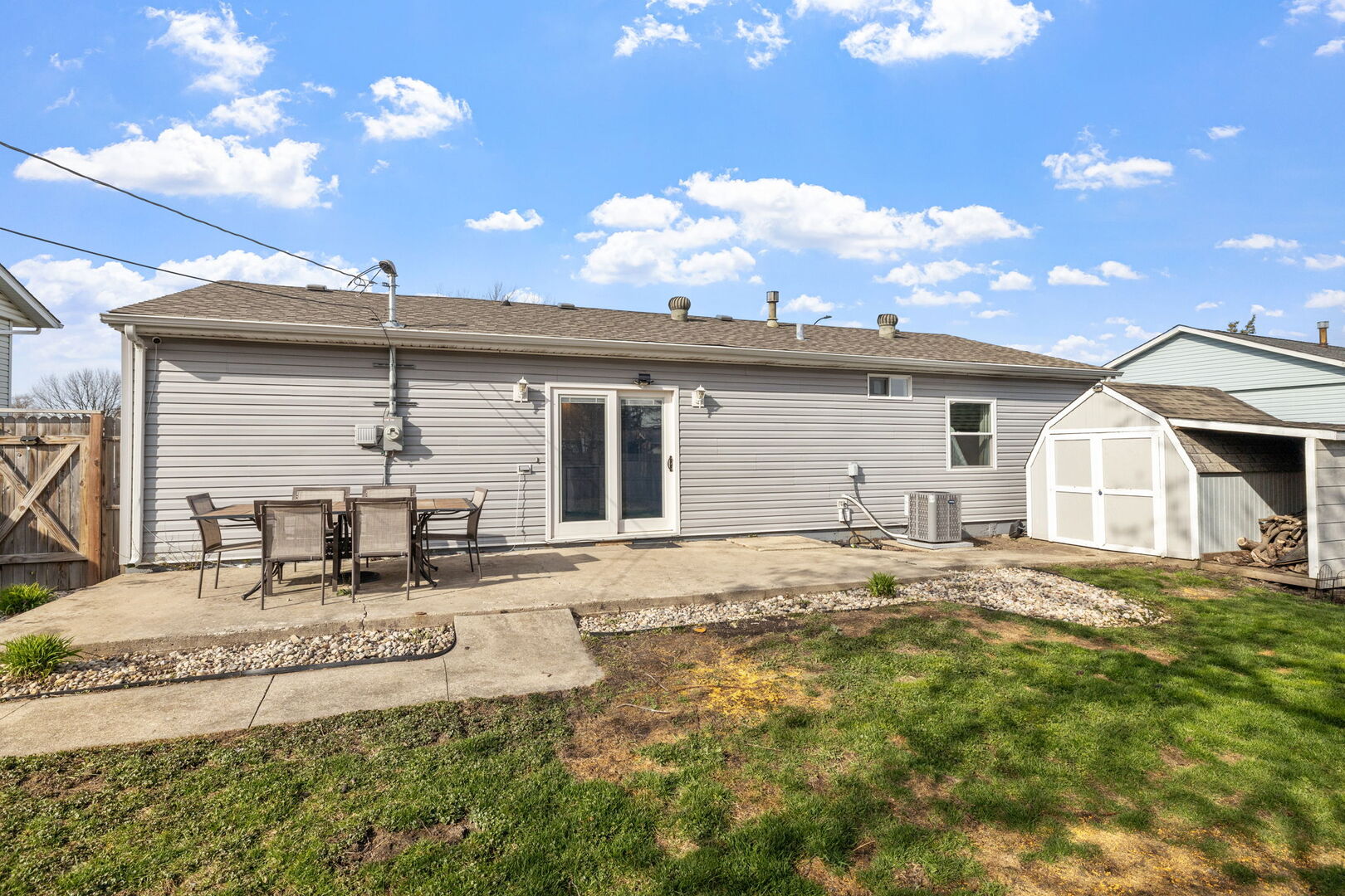 235 Murphy Drive Romeoville, IL 60446 - Photo 16 of 16 a view of a house with backyard and sitting area