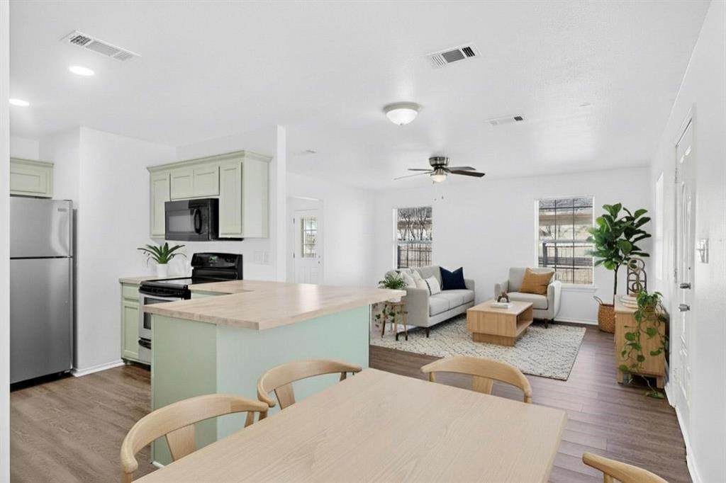 604 South Maxey Street Sherman, TX 75090 - Photo 3 of 28 Virtually staged shot of open concept living space