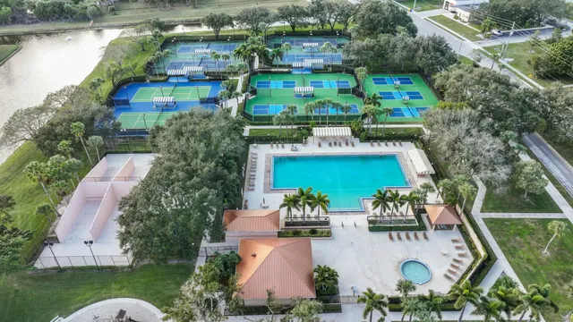 a view of swimming pool with a yard