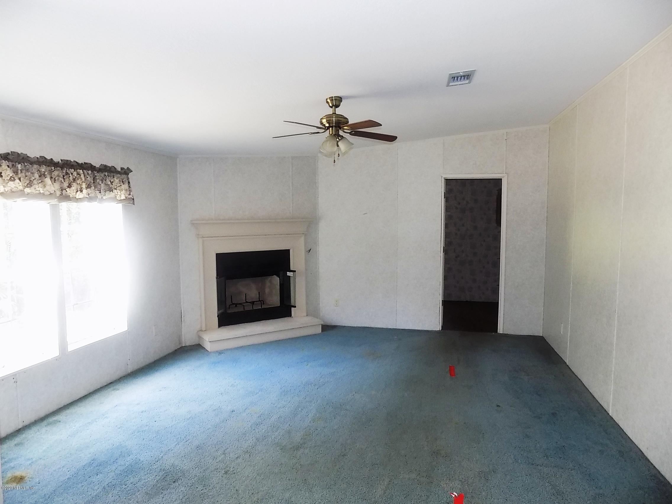 4453 Bondarenko Road Keystone Heights, FL 32656 - Photo 12 of 42 family room