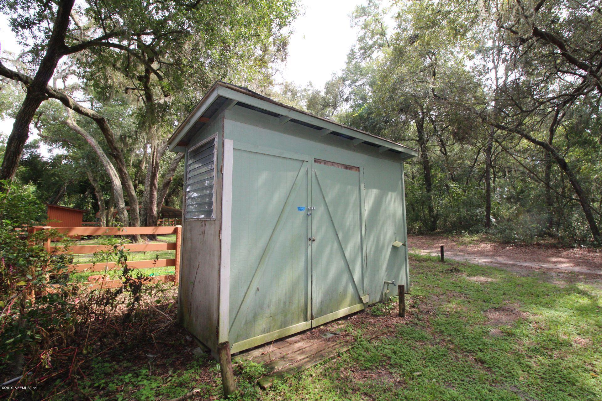 151 Depot Road Hawthorne, FL 32640 - Photo 26 of 27 26 Storage Shed with laundry