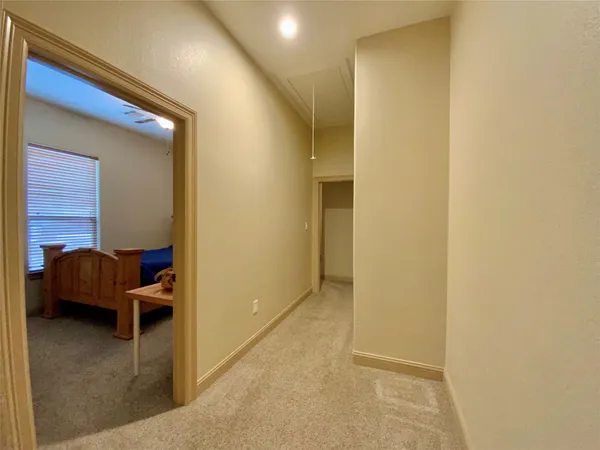 a view of a livingroom with furniture and furniture