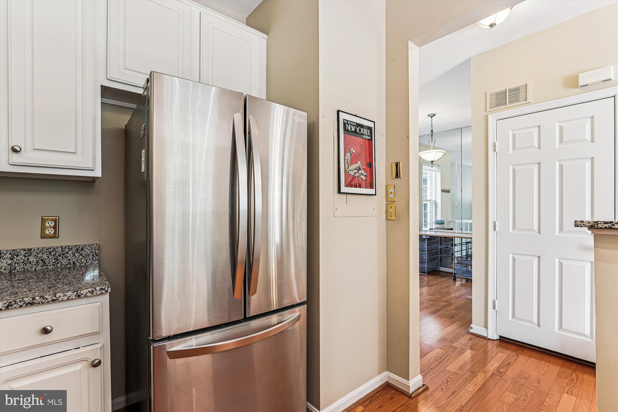 1307 Windleaf Drive, Unit 139N Reston, VA 20194 - Photo 17 of 38 a kitchen with stainless steel appliances granite countertop a refrigerator and a stove top oven
