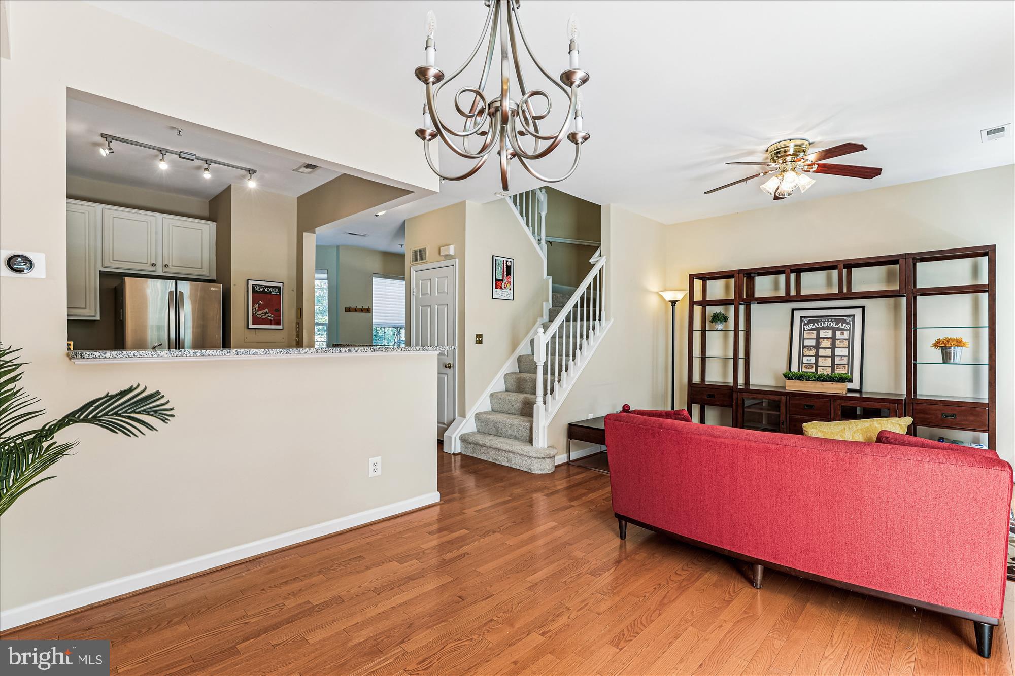 1307 Windleaf Drive, Unit 139N Reston, VA 20194 - Photo 18 of 38 a living room with furniture and wooden floor