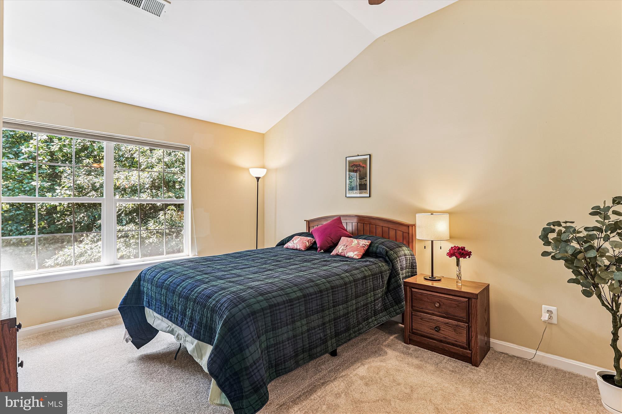 1307 Windleaf Drive, Unit 139N Reston, VA 20194 - Photo 24 of 38 a bedroom with a bed and a table