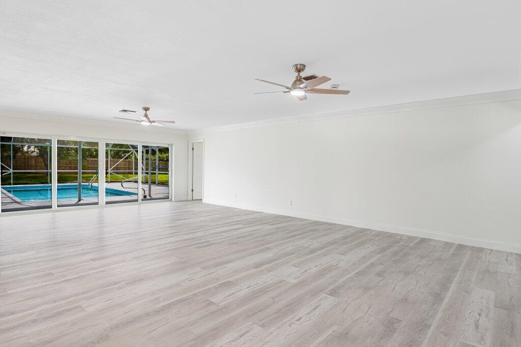 1899 Southeast Adair Road Port St. Lucie, FL 34952 - Photo 15 of 36 Entry to Living.jpeg-SMALL