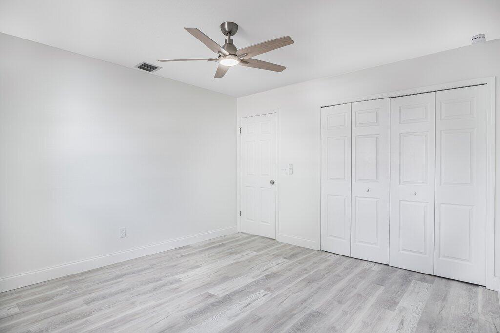 1899 Southeast Adair Road Port St. Lucie, FL 34952 - Photo 20 of 36 Guest Bedroom Entry.jpeg-SMALL