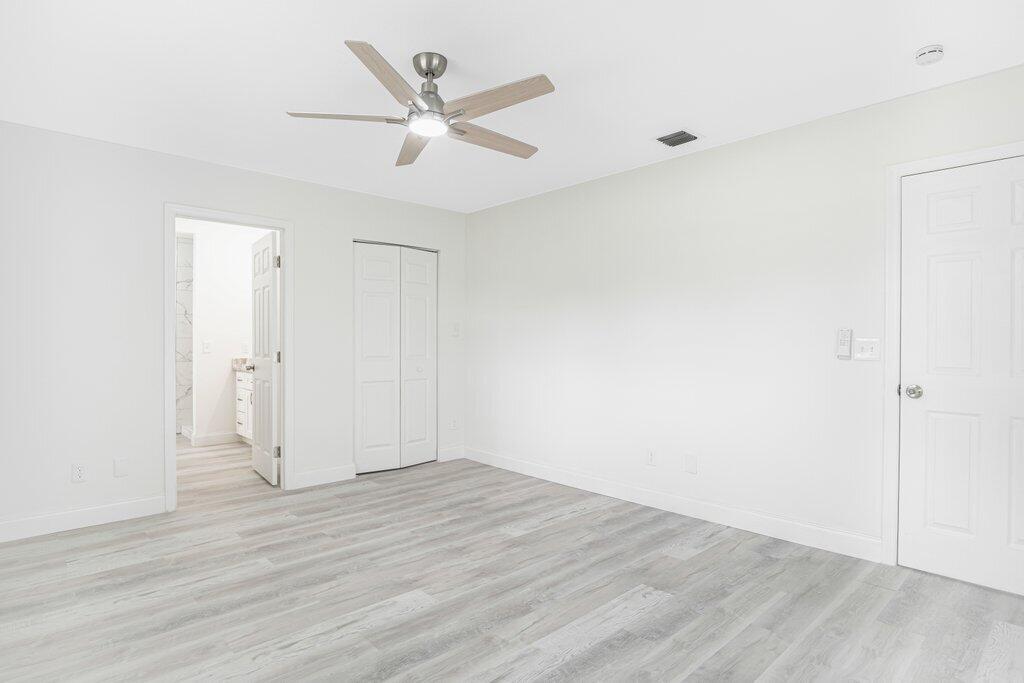 1899 Southeast Adair Road Port St. Lucie, FL 34952 - Photo 23 of 36 Primary to Walk-in.jpeg-SMALL