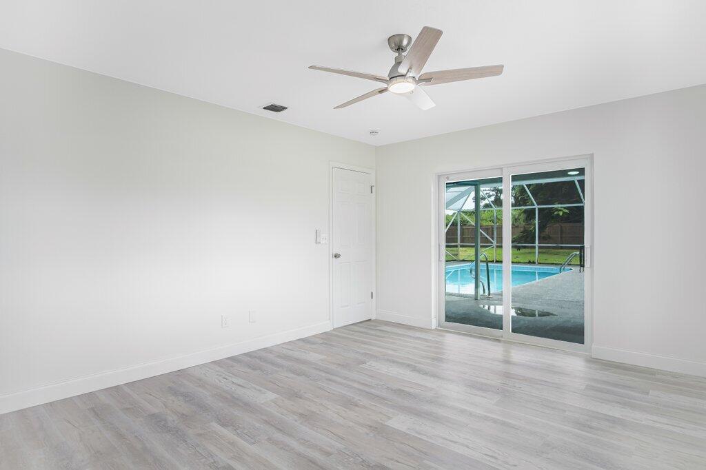 1899 Southeast Adair Road Port St. Lucie, FL 34952 - Photo 24 of 36 Primary to Patio.jpeg-SMALL