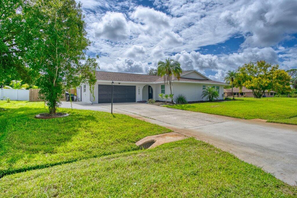 1899 Southeast Adair Road Port St. Lucie, FL 34952 - Photo 4 of 36 Front Exterior R.jpeg-SMALL