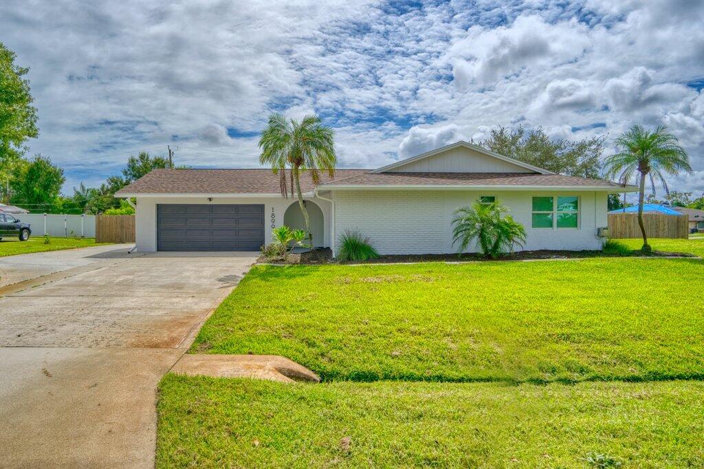 1899 Southeast Adair Road Port St. Lucie, FL 34952 - Photo 6 of 36 Front Exterior.jpeg-SMALL