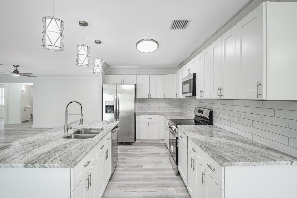 1899 Southeast Adair Road Port St. Lucie, FL 34952 - Photo 8 of 36 Kitchen R.jpeg-SMALL