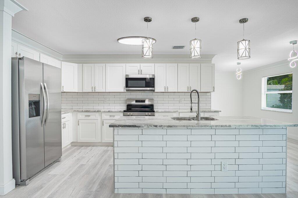 1899 Southeast Adair Road Port St. Lucie, FL 34952 - Photo 9 of 36 Kitchen.jpeg-SMALL